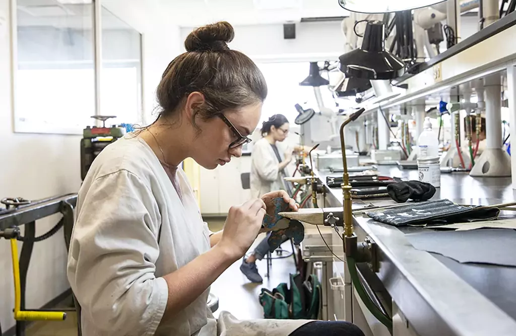 Engineering Students Working in a University Workshop