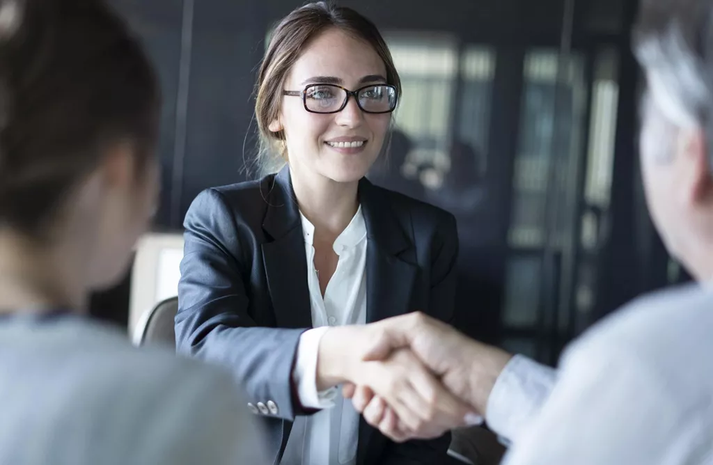 Counsellor Greeting Students with a Friendly, Confident Smile