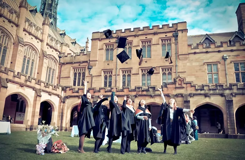 Graduates Celebrating by Tossing Caps in the Air
