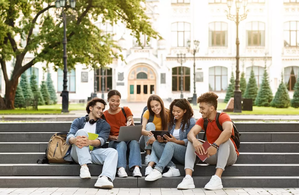 Students Sitting on Campus Steps Studying Together