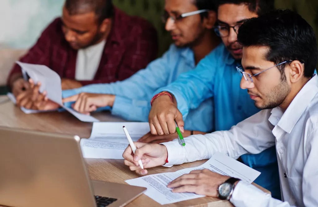 Students Reviewing Documents During Study Abroad Counselling