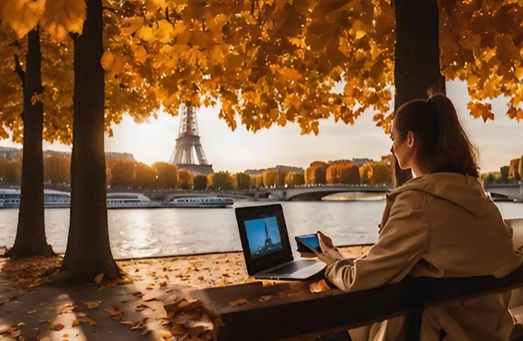 Student Studying near Eiffel Tower, Representing Study in France Opportunity