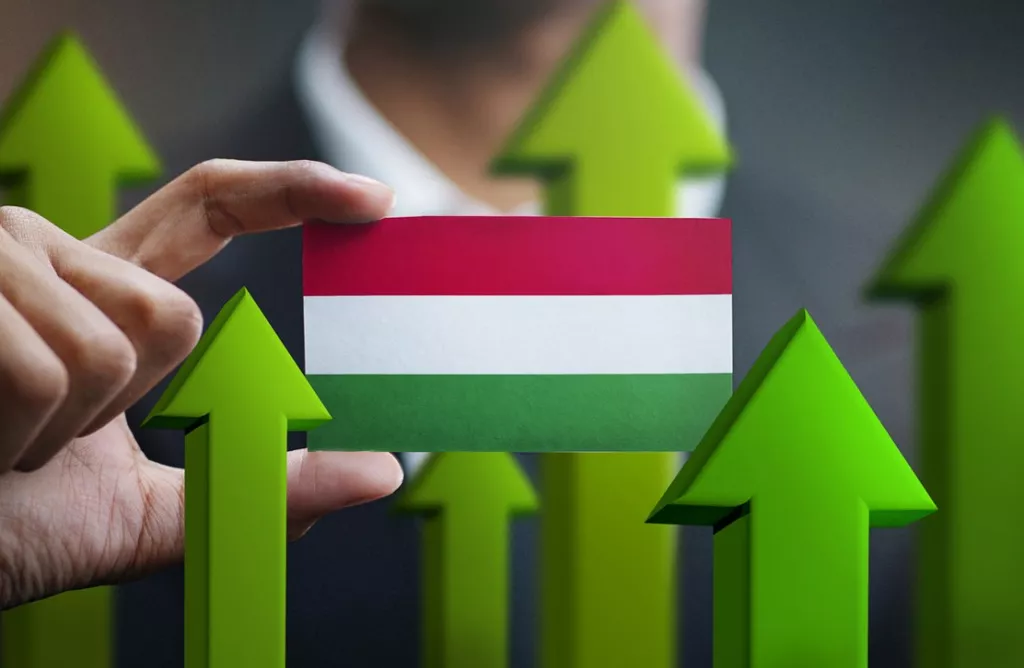 Hungary Flag with Upward Arrows Showing Growth and Opportunities.