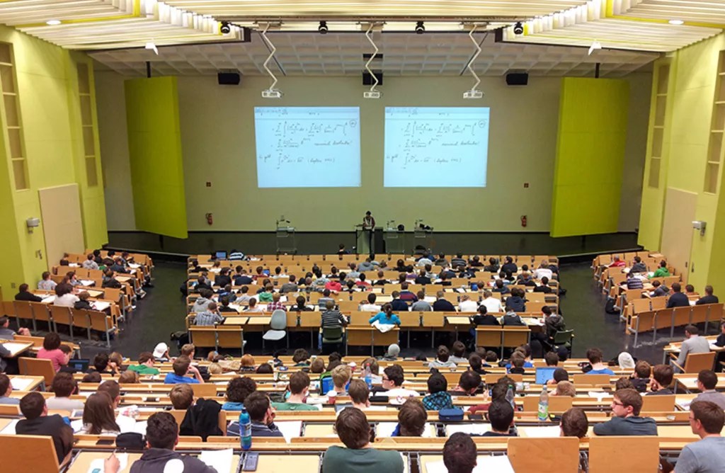 International students studying in a German university lecture hall