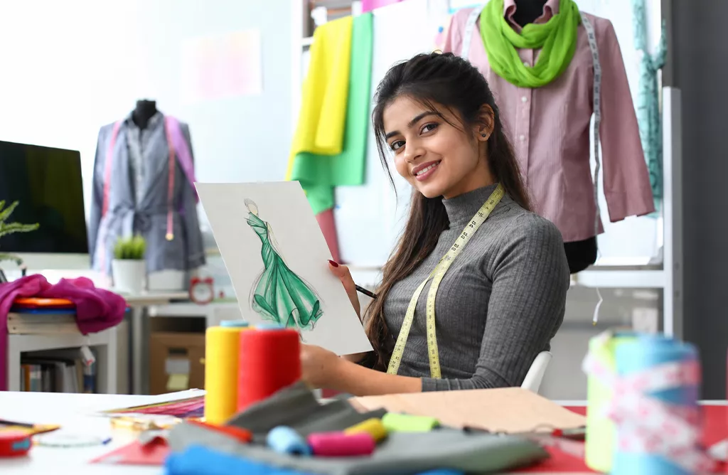 Fashion Design Student Creating a Dress Sketch While Studying Fashion In France
