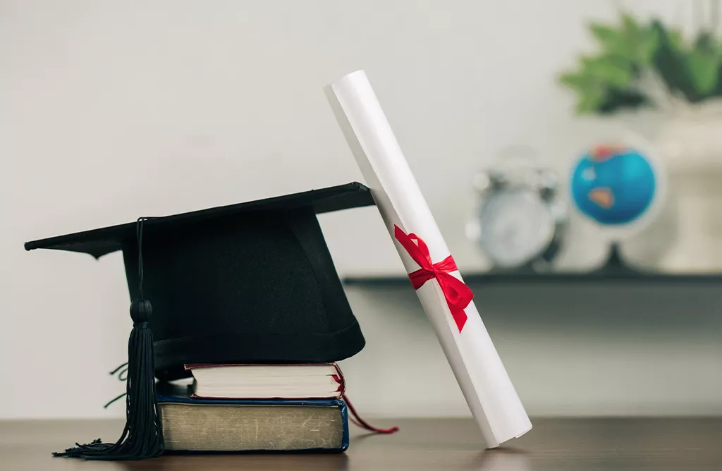 Graduation Cap and Diploma Representing Higher Education in Spain